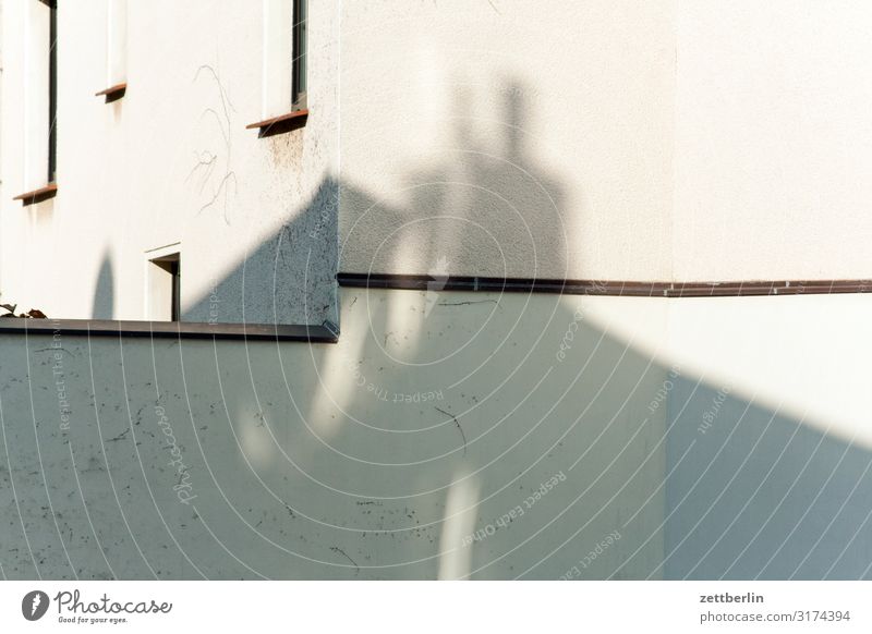 Facade in the sun House (Residential Structure) Apartment Building Living or residing Residential area Wall (barrier) Wall (building) Window Light Shadow