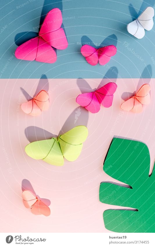 Multi-colored origami butterflies from above Lifestyle Design Beautiful Leisure and hobbies Playing Decoration Wallpaper Art Culture Butterfly Paper Toys