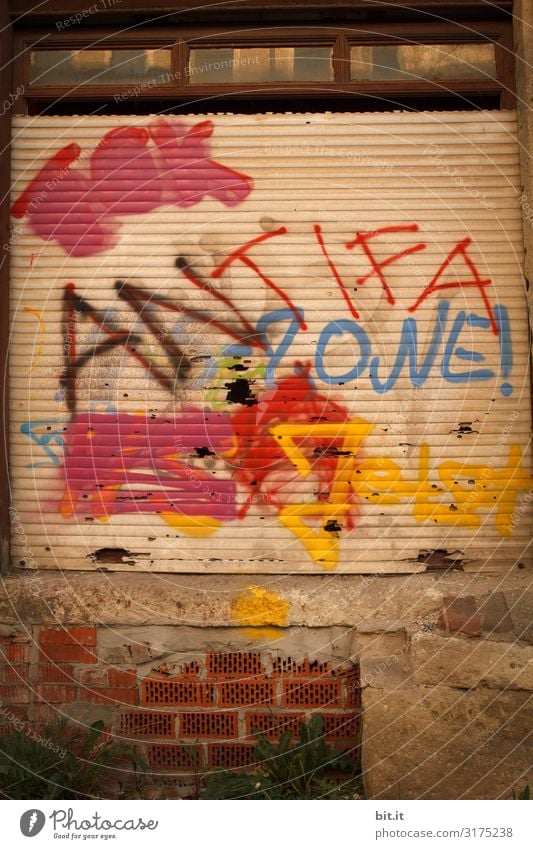 Antifa, graffiti on a door. Art Work of art Painting and drawing (object) Culture Youth culture Subculture Wall (barrier) Wall (building) Facade Sign Characters