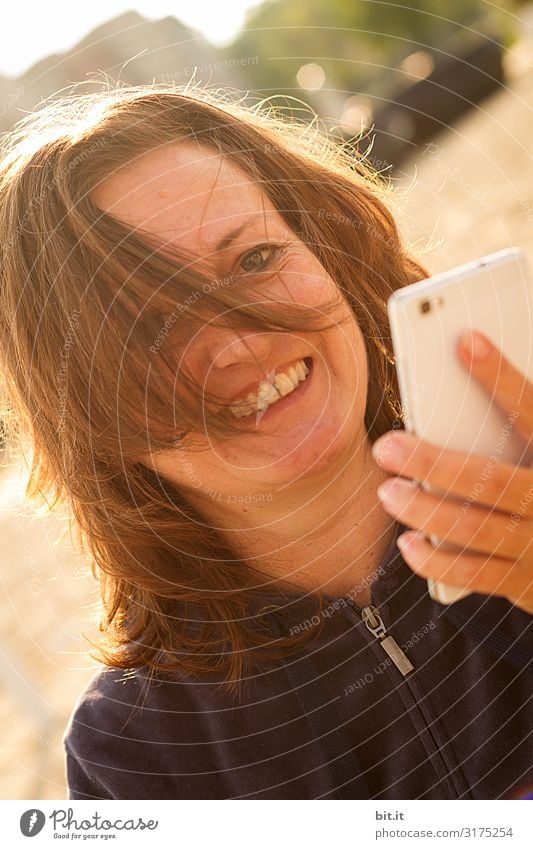 mobile Cellphone Human being Feminine Woman Adults Laughter To call someone (telephone) Exterior shot Reflection Portrait photograph Upper body Front view