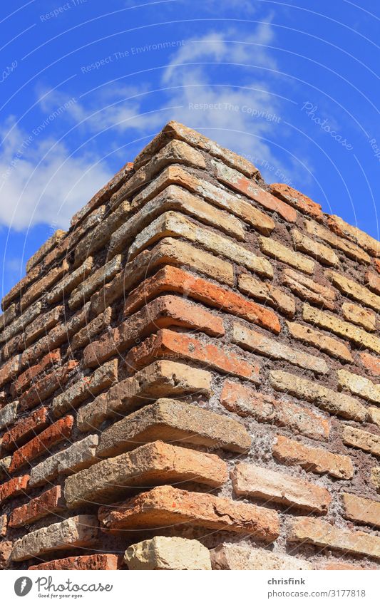 Roman giant wall in front of blue sky Art Village Town House (Residential Structure) Facade Tourist Attraction Stone Sand Brick Stand Living or residing Blue