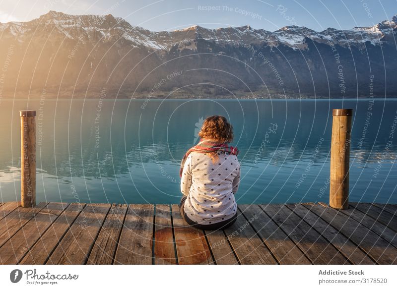 woman on pier in mountains Woman Jetty Lake Mountain Switzerland Nature Vacation & Travel Tourism Landscape Happy azure Turquoise Picturesque Peace Majestic