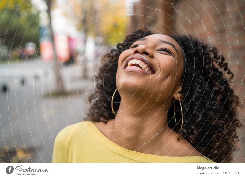 Portrait of Afro-american woman laughing. Beautiful Hair and hairstyles Relaxation Calm Camera Human being Woman Adults Street Brunette Smiling Laughter Stand