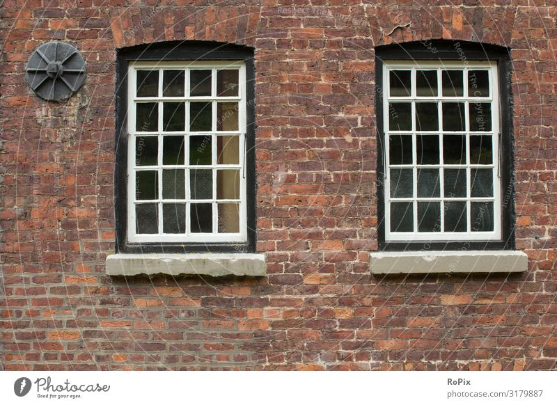 Old sash bar windows on a factory building. Wall (barrier) Grating Wall (building) rampart Depot Granite Ruin Sandstone Architecture country Country life