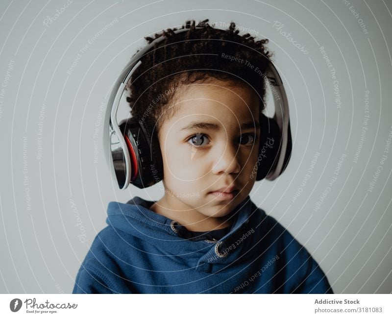 Black child listening to music Boy (child) Listening Music Headphones Hip & trendy Easygoing African-American Lifestyle Leisure and hobbies sweatshirt
