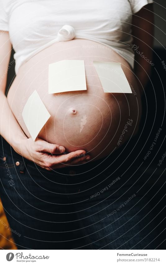 Baby belly with sticky notes Feminine Woman Adults 1 Human being 18 - 30 years Youth (Young adults) 30 - 45 years Communicate Piece of paper Write Accumulate