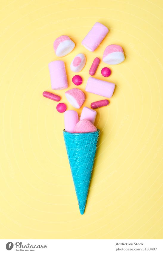 Blue waffle cone with spilled candies Cone Candy Multicoloured Conceptual design Sweet Dessert Delicious Style Confectionary Bright Pink Gourmet Jelly gummy