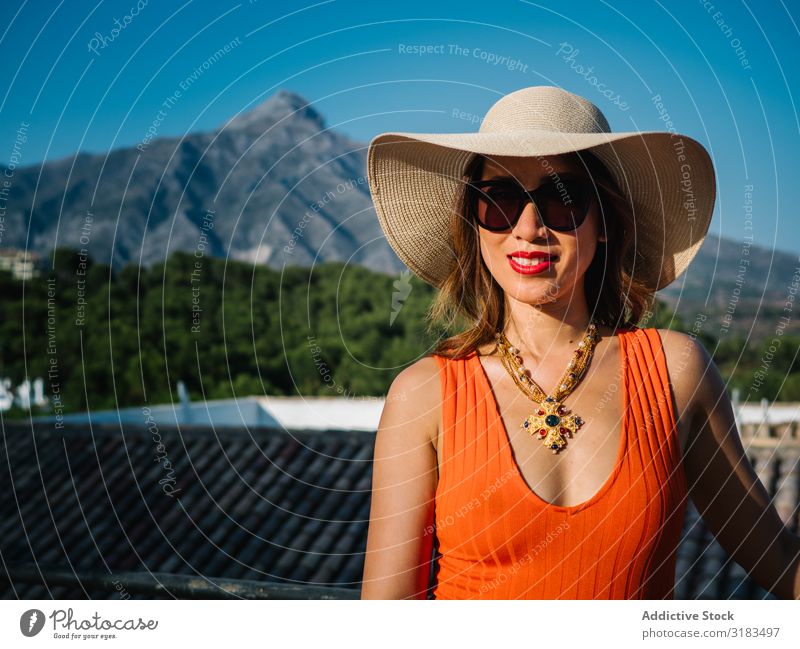 young elegant chinese woman at mediterranean scenario Elegant Chinese Woman wealthy Panama hat Beauty Photography Grass Leaf Attractive Lady Adults Natural