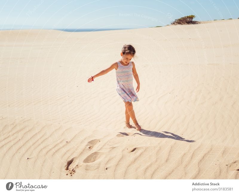 Cute little girl playing with sand at beach Sand Beach Girl Child Small Playing Summer Vacation & Travel Ocean Youth (Young adults) Exterior shot Beautiful