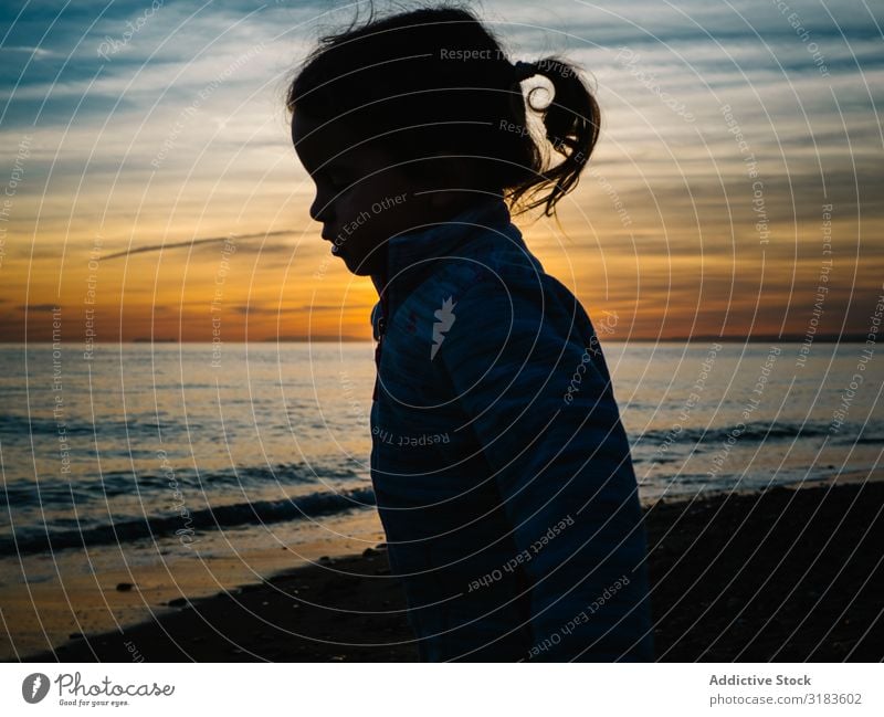 little girl silhouette at beach sunset Girl Silhouette Small Sunset Child Beach Exterior shot Nature Human being Happy Summer Water Lifestyle Happiness Joy