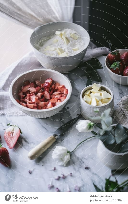 Ingredients for strawberry pastry Baked goods Kitchen Strawberry Flour Butter Cooking Preparation Table Marble Culinary recipe Fresh Berries Fruit Cut pieces