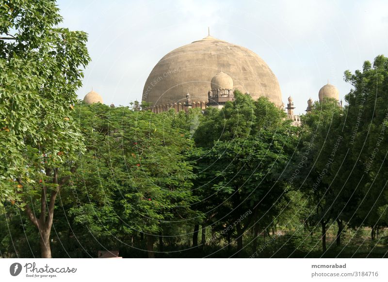Dome behind Greenery Style Design Plant Tree Building Architecture Balcony Monument gol gumbaz dome Arena second biggest Tomb graves Burial site tombstone