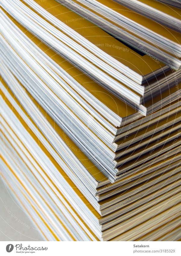 Stack of yellow monthly magazine Leisure and hobbies Reading Newspaper Magazine Book Library Paper Collection Yellow White Accumulation background education