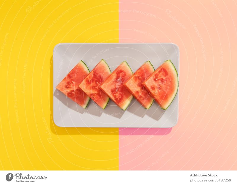 Watermelon on colorful background Water melon Fruit Healthy Tropical Exotic Colour Cut Seeds Red Background picture Summer Juicy pieces Multicoloured Vitamin