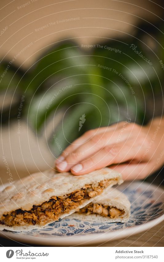 Hand holding hot delicious Chinese burgers in Asian restaurant Food Hold Anonymous Sandwich Pork Cinnamon Steamed Roll asian Café Restaurant Dish Meal Nutrition