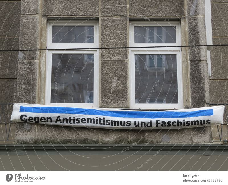 Against Anti-Semitism and Fascism House (Residential Structure) Old building Wall (barrier) Wall (building) Window banner Characters Communicate Blue Brown