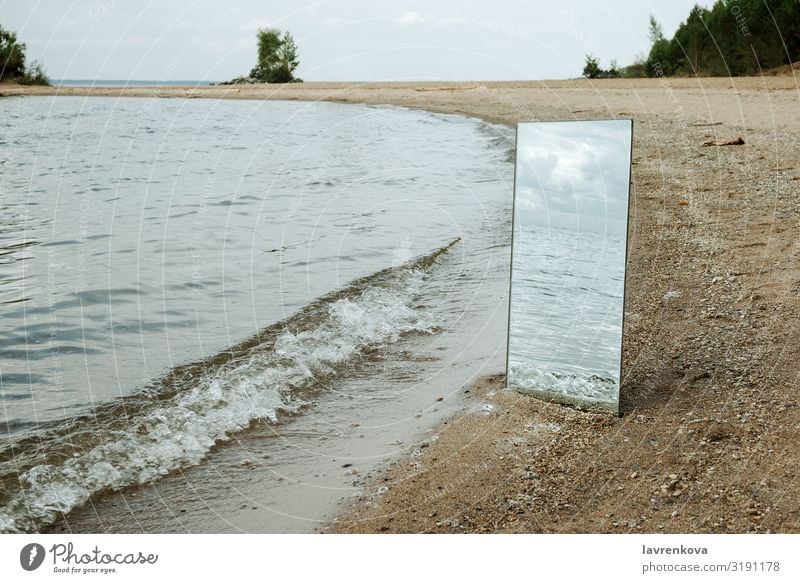 Mirror standing on a beach with waves reflection Beach Conceptual design Environment Horizontal Landscape Nature Exterior shot Reflection River Sand Seasons Sky