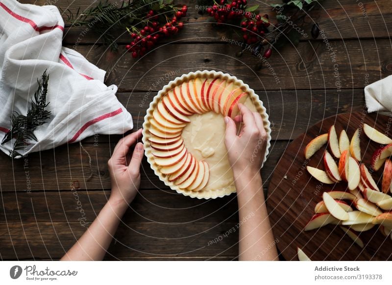 unrecognizable woman making a apple pie on a wooden table Pie Apple Fresh Wood Rustic Window Home-made Day Brown Confectionary Organic parchment Warmth Aromatic