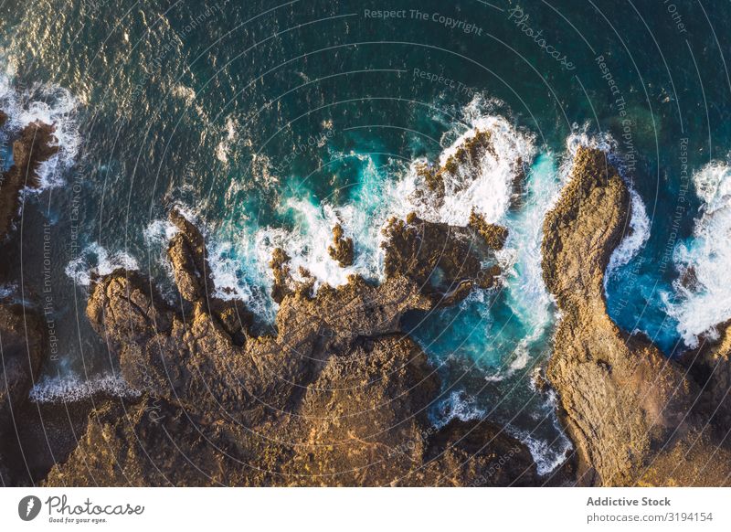 Drone view of coast with cliffs Coast Cliff Waves drone view Rock Splashing Remote Aircraft foamy Day Spain Tenerife Water Height Ocean Landscape Nature