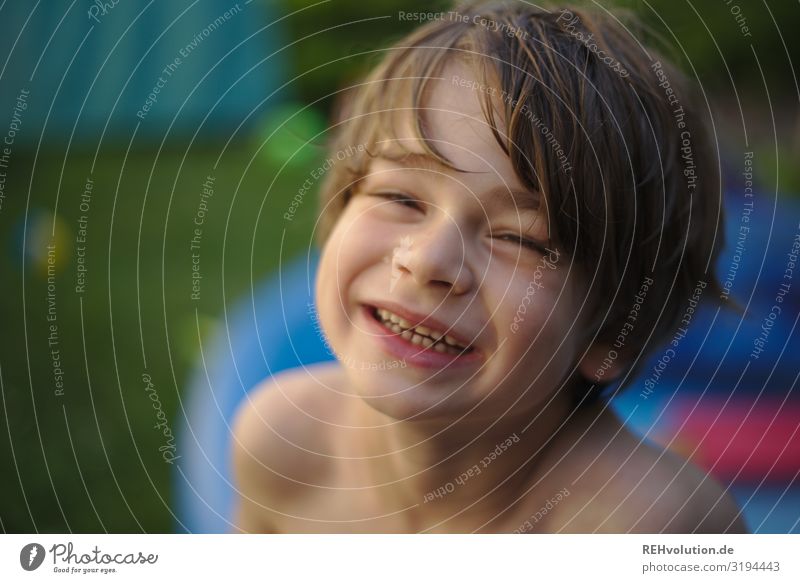 Boy laughing in the garden Boy (child) 7 years fortunate Happy cooling warm Joie de vivre (Vitality) Joy portrait Face Looking into the camera Front view