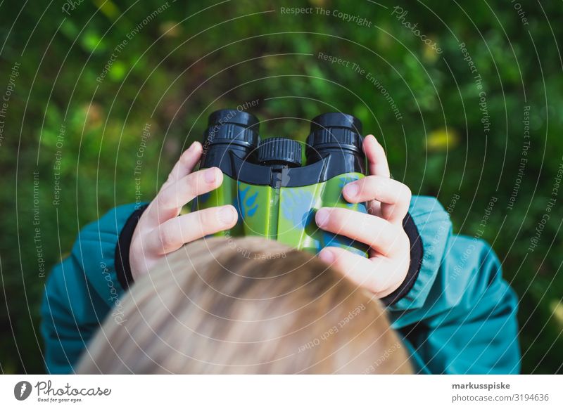 Boy looks through binoculars Lifestyle Leisure and hobbies Playing Vacation & Travel Tourism Trip Adventure Far-off places Freedom Hiking Garden Parenting
