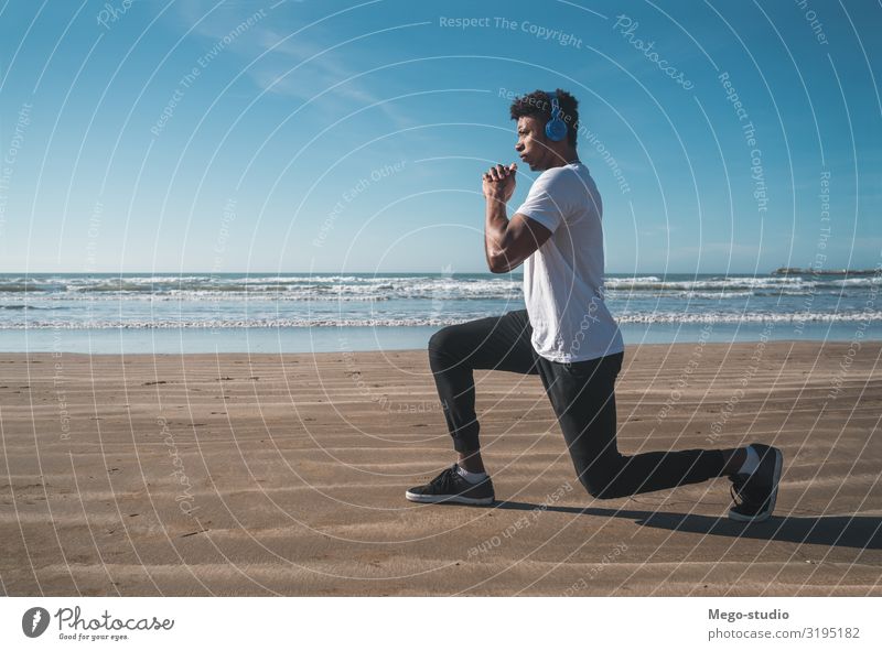 Athletic man doing exercise at the beach. Personal hygiene Body Relaxation Leisure and hobbies Beach Sports Jogging Work and employment Human being Man Adults