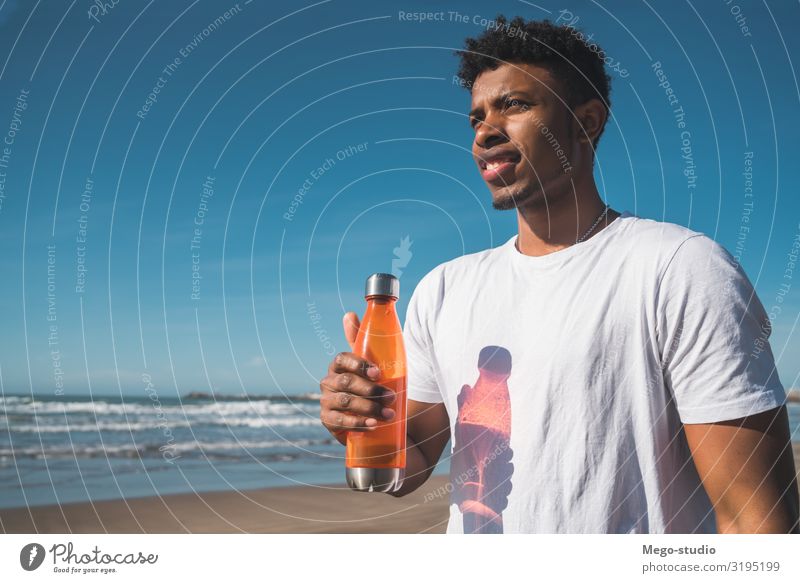 Athletic man with a bottle of water. Drinking Lifestyle Style Leisure and hobbies Beach Sports Human being Masculine Man Adults Sand Fitness Muscular Strong