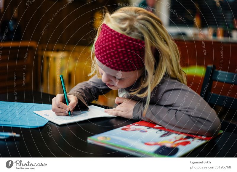 Child writing Parenting Education School Study Student Homework Feminine Girl Infancy 1 Human being 3 - 8 years Stationery Paper Piece of paper Pen Write