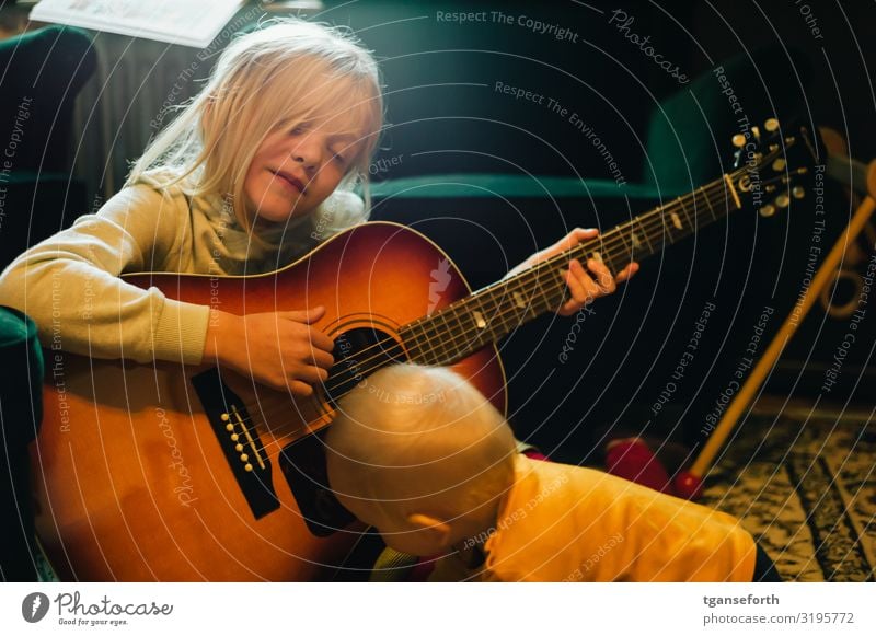 Sister and brother playing with a guitar Playing Human being Masculine Feminine Child Toddler Girl Boy (child) Brothers and sisters Family & Relations Infancy 2