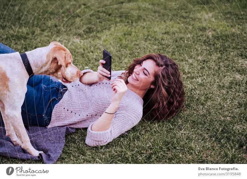 young woman taking a selfie with mobile phone with her dog at the park. autumn season Cellphone Woman Dog Selfie Illustration Photography Take Technology Park