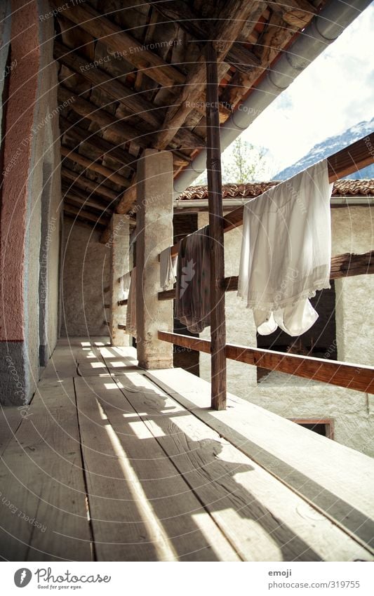 retro clothes drying House (Residential Structure) Detached house Hut Wall (barrier) Wall (building) Rag Cotton Old Sustainability Natural Old fashioned Retro