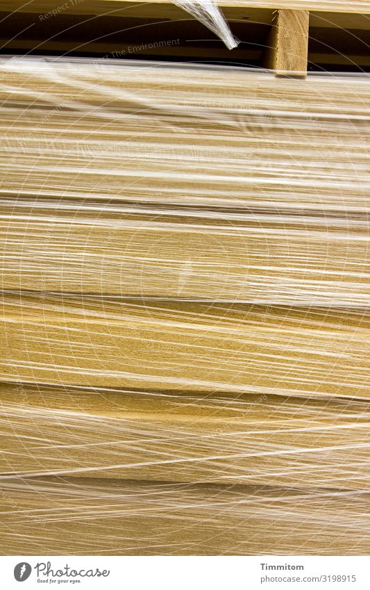 Wood in foil Building material pallet wrapped Packing film Plastic plastic Packaging Transparent tight lines Deserted Colour photo