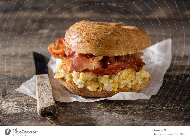 Bagel sandwich with slab bacon, egg and cheese Sandwich Bacon Egg Cheese Bread Snack Fast food Delicious Food Healthy Eating Food photograph Lunch Sesame Dough