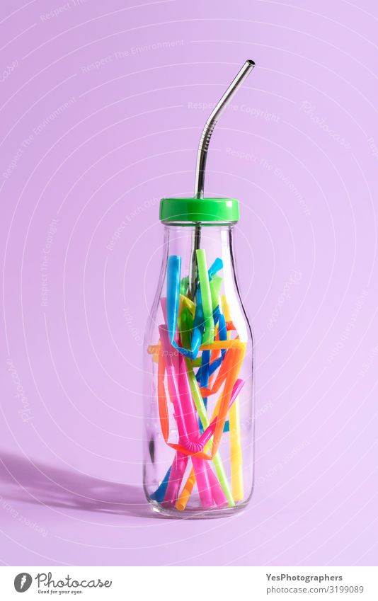 Cutting plastic straws Metal drinking straw Reduce plastic waste - a  Royalty Free Stock Photo from Photocase