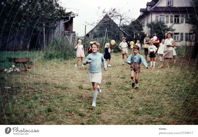 Childhood games. Swinging eggs. Food Egg Living or residing Flat (apartment) Garden Sports Girl Boy (child) Crowd of people Meadow House (Residential Structure)