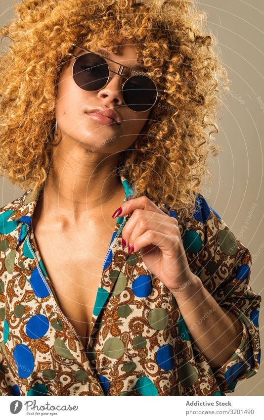 Retro woman with curly hair Woman outfit Ethnic Sunglasses Blouse To enjoy Curly hair Blonde Model Vintage Style Hip & trendy Ornament Pattern Elegant shades