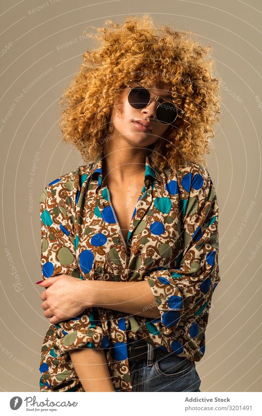 Retro woman with curly hair Woman outfit Ethnic Sunglasses Blouse To enjoy Curly hair Blonde Model Vintage Style Hip & trendy Ornament Pattern Elegant shades