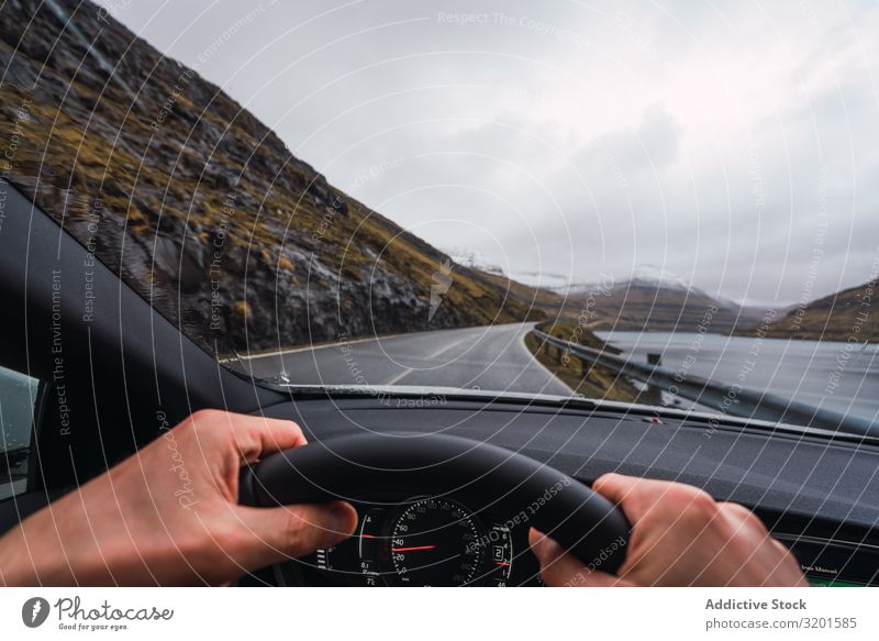 from inside a car view of anonymous person driving a car in a raining day Car Street Trip Hill Landscape Ride Clouds Sky Føroyar terrain Cloud cover Weather