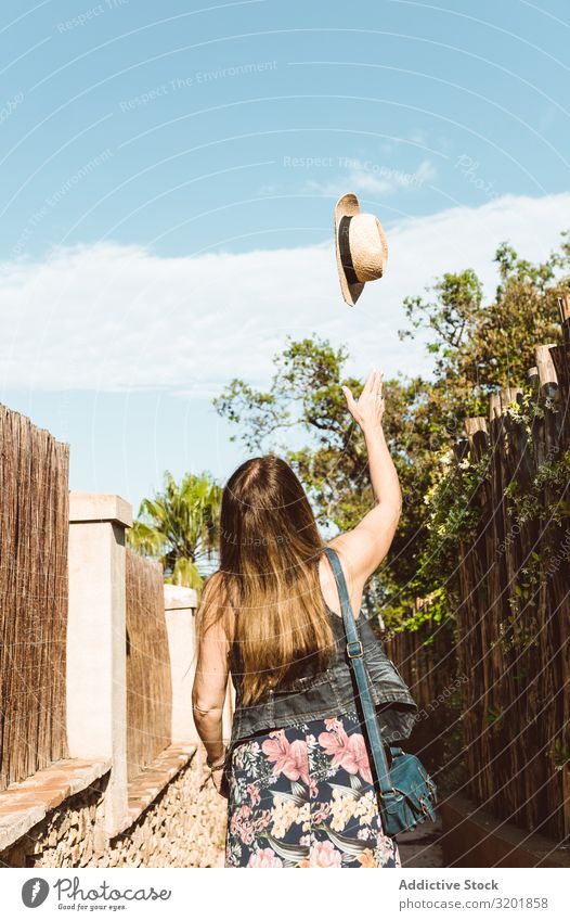Happy woman throwing hat up Woman Straw hat Summer toss Vacation & Travel Cheerful Style Throw Tourism Emotions Expression Beauty Photography Smiling Playful