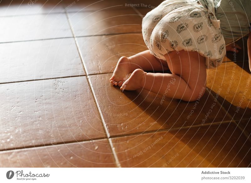 Baby crawling on all fours on floor Crawl Small babyhood Cute Playing Joy exploring Beautiful Cheerful Infancy Discovery pretty Delightful Happiness suckling
