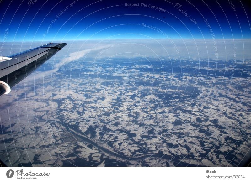 heaven's flight Snow layer Horizon Airplane Aviation Blue sky Wing country from above bright blue Sky above the earth