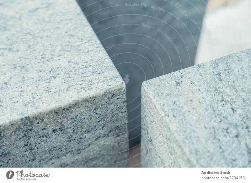 Angles of gray marble cubes Dice Marble angles Smooth Surface Beach zarautz Spain Stone Gray Block Material Solid mineral Detail element Exterior