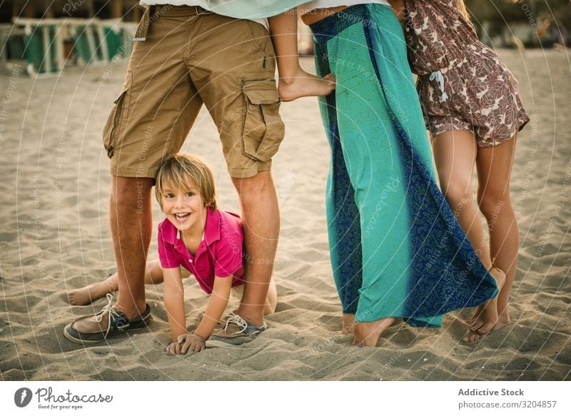Crop parents with kids on beach Family & Relations Beach Love Group Parents Child Boy (child) Girl Happy Delightful Playful sibling Summer Vacation & Travel