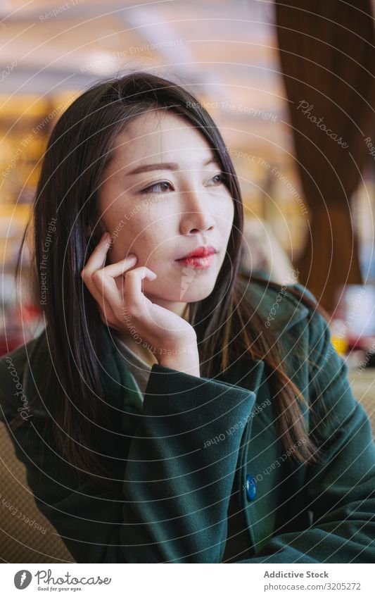 Portrait of young asian woman looking away Woman Café Table Sit Youth (Young adults) To enjoy Lifestyle Leisure and hobbies Rest Relaxation Ethnic Style