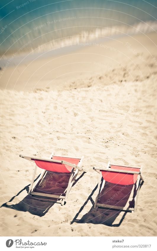 wait for the 2nd Advent Sun Waves Beach Ocean Relaxation Warmth Red Turquoise Calm Vacation & Travel Deckchair Empty Summer vacation Colour photo Exterior shot