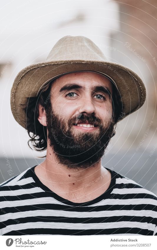Bearded male on deserted road man hat striped t-shirt la restinga el hierro canary island vacation travel adventure journey tourism young person handsome