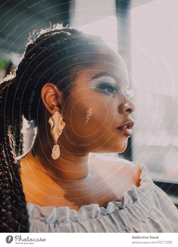 Headshot of confident trendy African American woman headshot bright curvy beautiful african american black ethnic makeup content attractive portrait sunshine