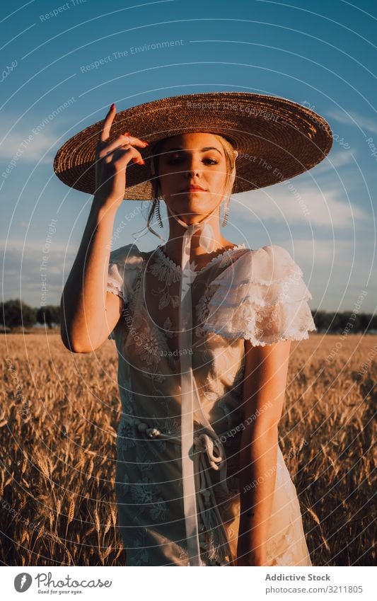 Woman in big round hat in middle of wheat field woman boho lace beautiful style tender bride sensual natural summer romantic wedding blonde straw hippie