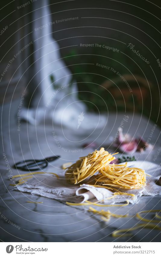 From above dry pasta on table tasty vegetable italian food meal dish delicious spaghetti gourmet preparation traditional fresh eating kitchen portion culinary
