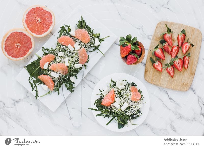 Strawberry, grapefruit and rocket salad on bowl strawberry almond greenery avocado delicious served food meal gourmet cuisine nutrition dinner spice vegetable